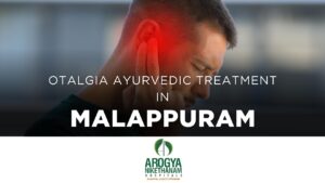 Therapist performing Karnapoorana—warm herbal oil being gently instilled into a patient’s ear to relieve otalgia